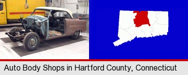 a vintage automobile in an auto body shop; Hartford County highlighted in red on a map