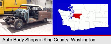 a vintage automobile in an auto body shop; King County highlighted in red on a map