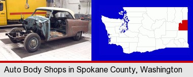 a vintage automobile in an auto body shop; Spokane County highlighted in red on a map