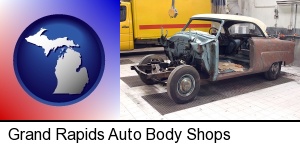 Grand Rapids, Michigan - a vintage automobile in an auto body shop