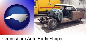 a vintage automobile in an auto body shop in Greensboro, NC