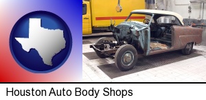 Houston, Texas - a vintage automobile in an auto body shop