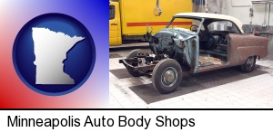 Minneapolis, Minnesota - a vintage automobile in an auto body shop