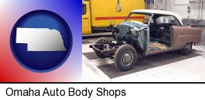 Omaha, Nebraska - a vintage automobile in an auto body shop