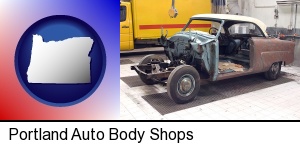 Portland, Oregon - a vintage automobile in an auto body shop