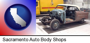 Sacramento, California - a vintage automobile in an auto body shop