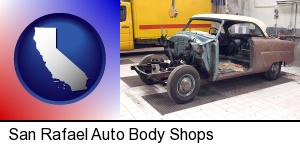 a vintage automobile in an auto body shop in San Rafael, CA