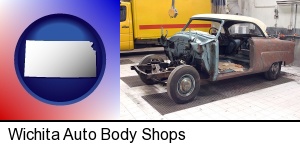 Wichita, Kansas - a vintage automobile in an auto body shop