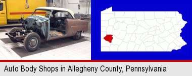 a vintage automobile in an auto body shop; Allegheny County highlighted in red on a map