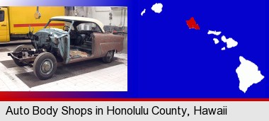 a vintage automobile in an auto body shop; Honolulu County highlighted in red on a map
