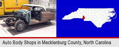 a vintage automobile in an auto body shop; Mecklenburg County highlighted in red on a map